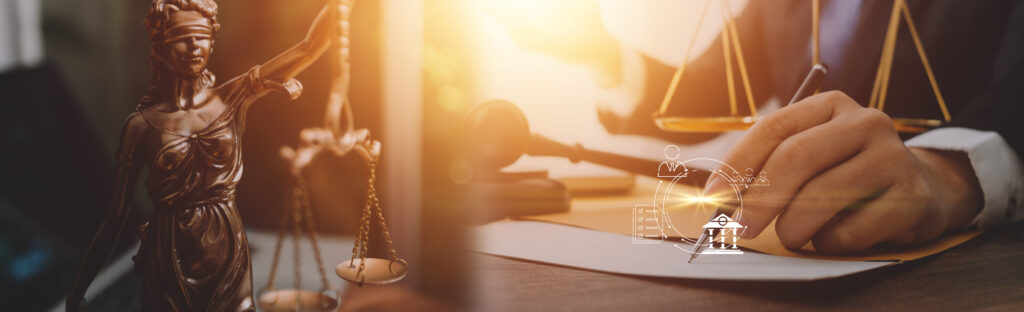 justice and law concept.Male judge in a courtroom on wooden table and Counselor or Male lawyer working in office. Legal law, advice and justice concept.
